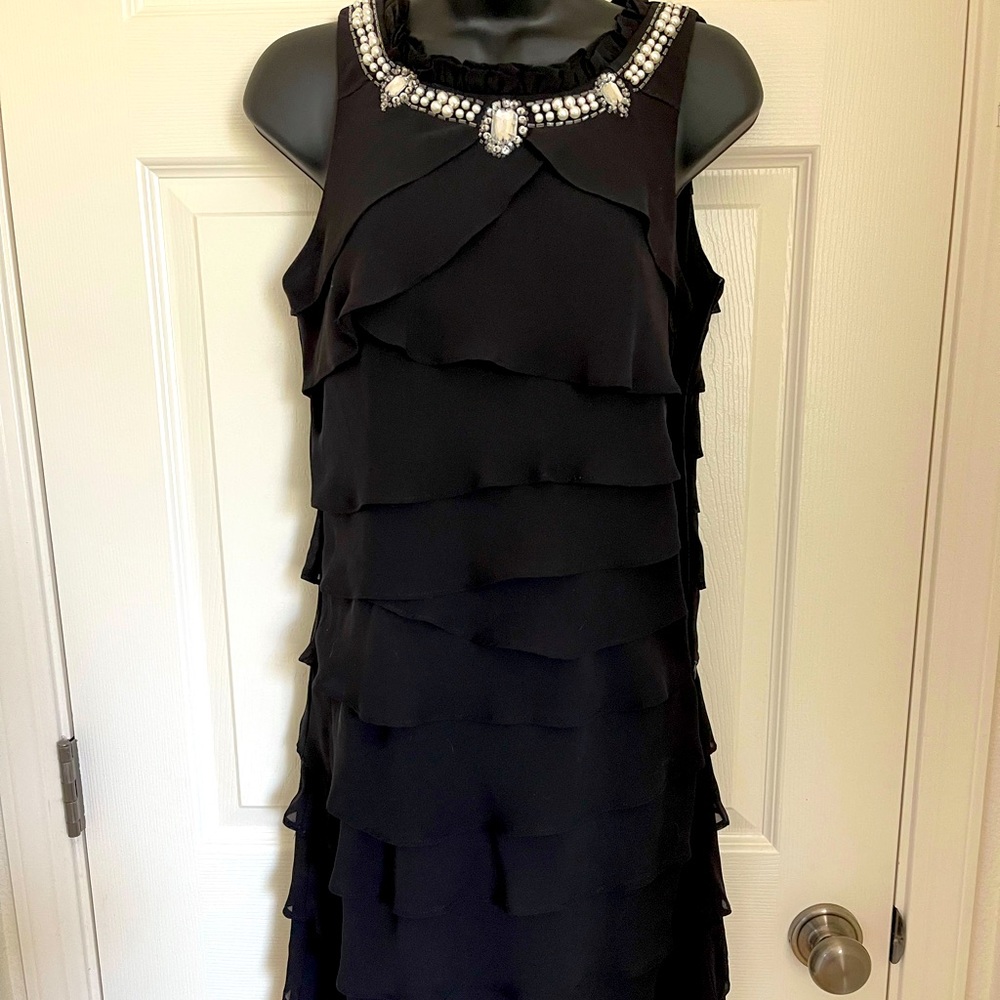 LBD with rhinestones and ruching.